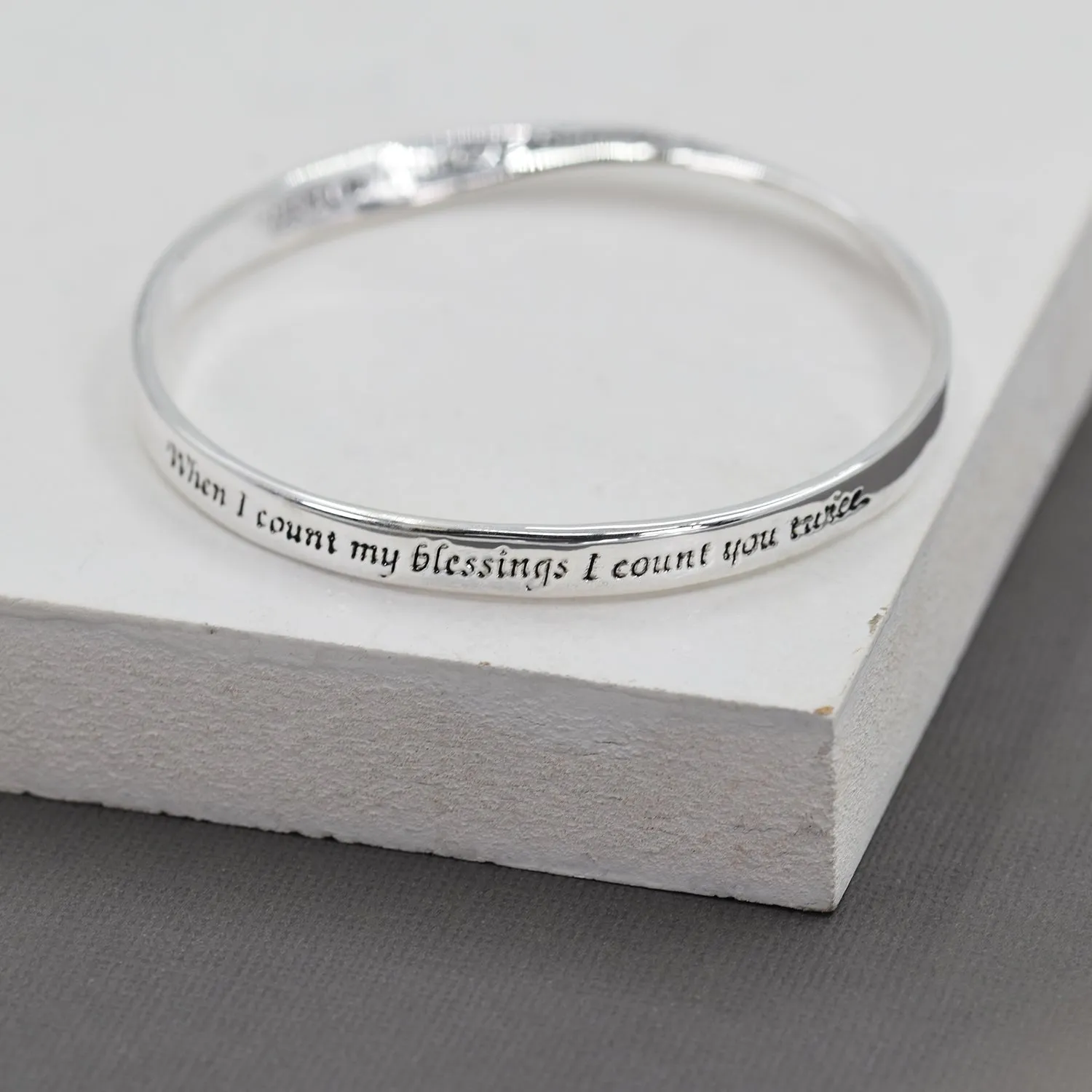 "When I count my blessing . . ."  bangle